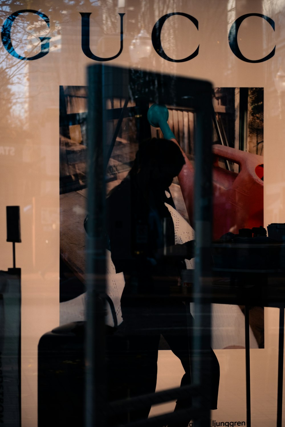 man in black jacket sitting on chair