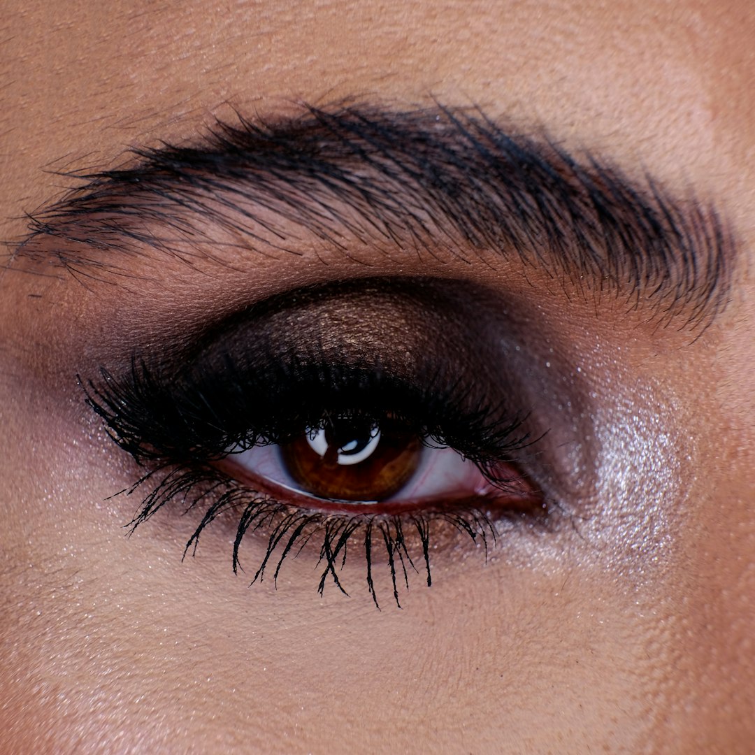 persons eye with black mascara