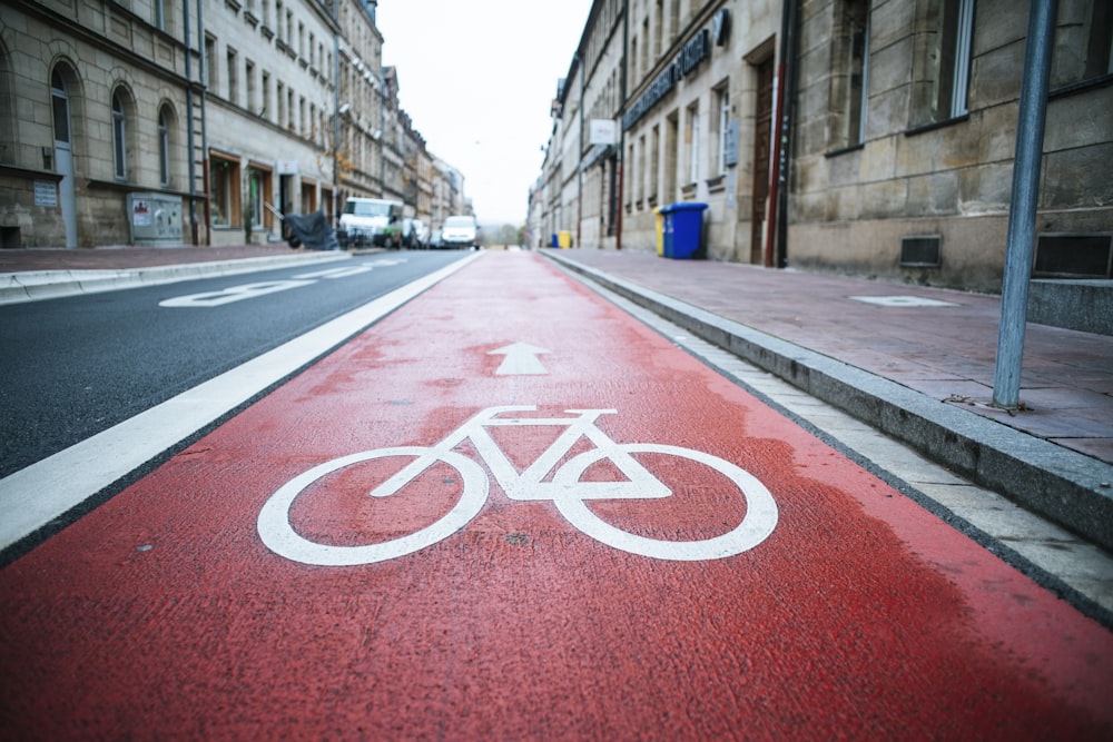 red and white love print on road