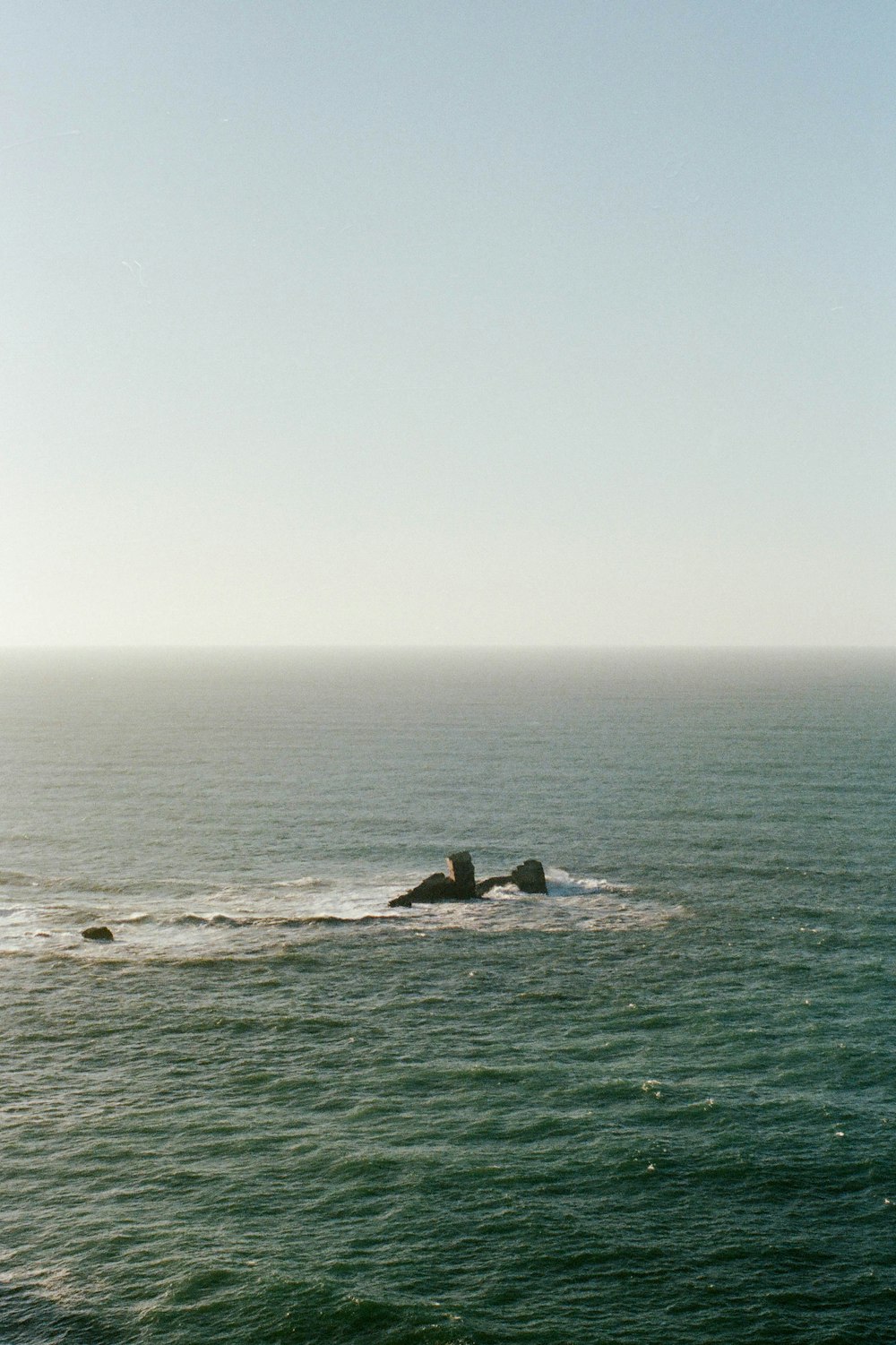 person surfing on sea during daytime