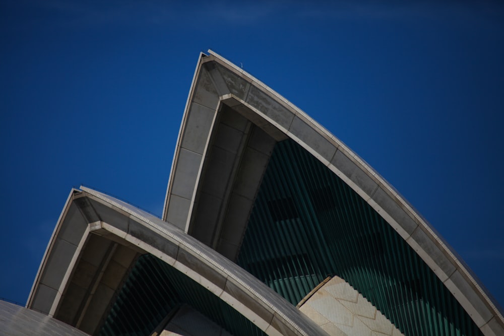 white concrete building under blue sky during daytime