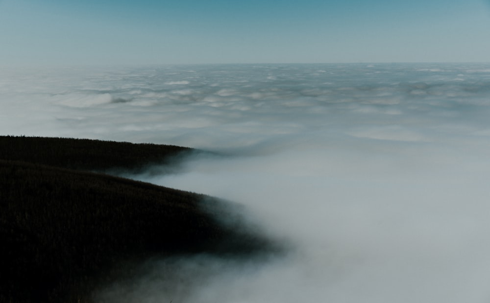 white clouds over the mountains