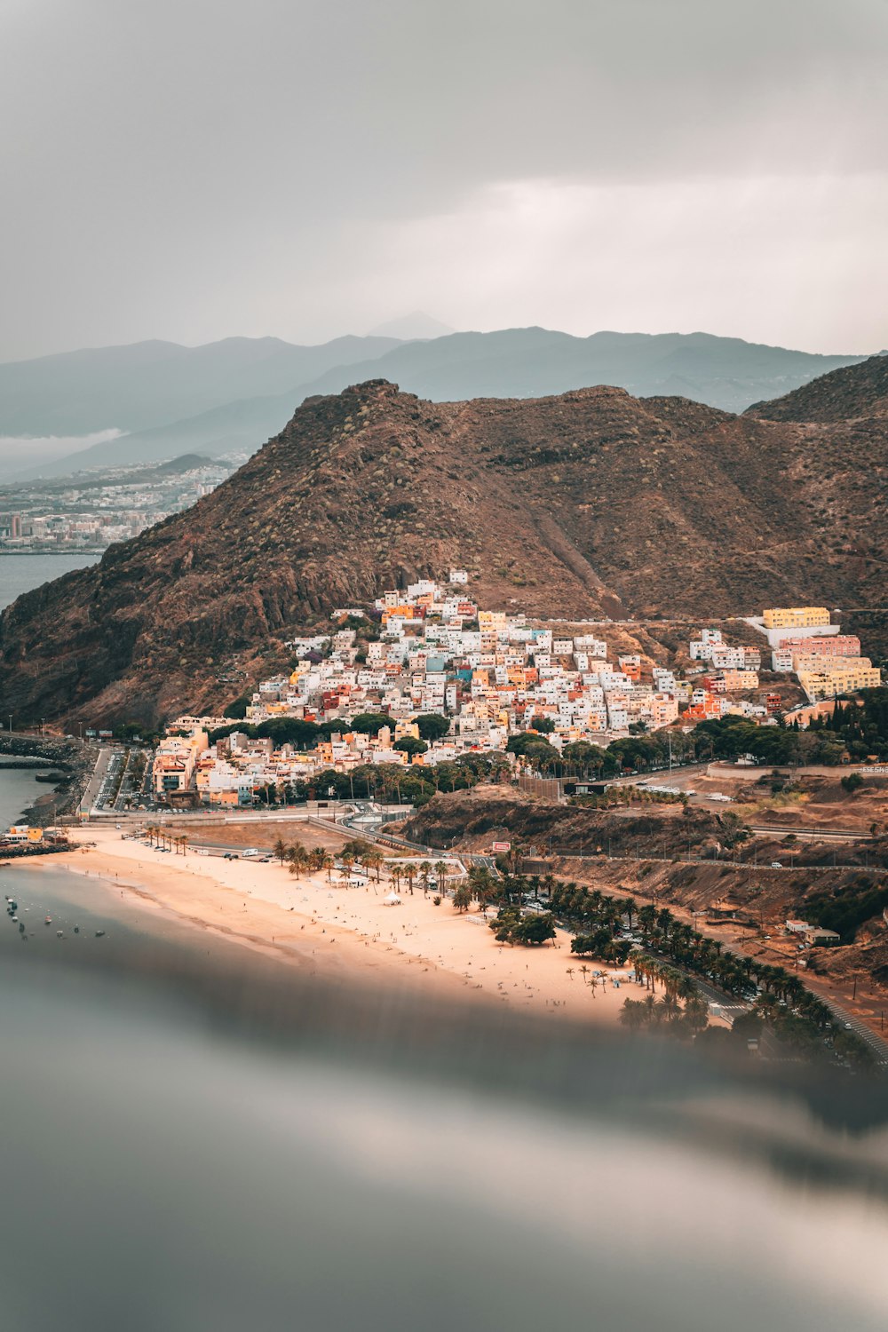 city near body of water during daytime