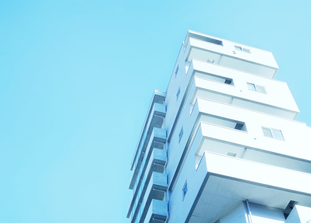 white concrete building under blue sky during daytime