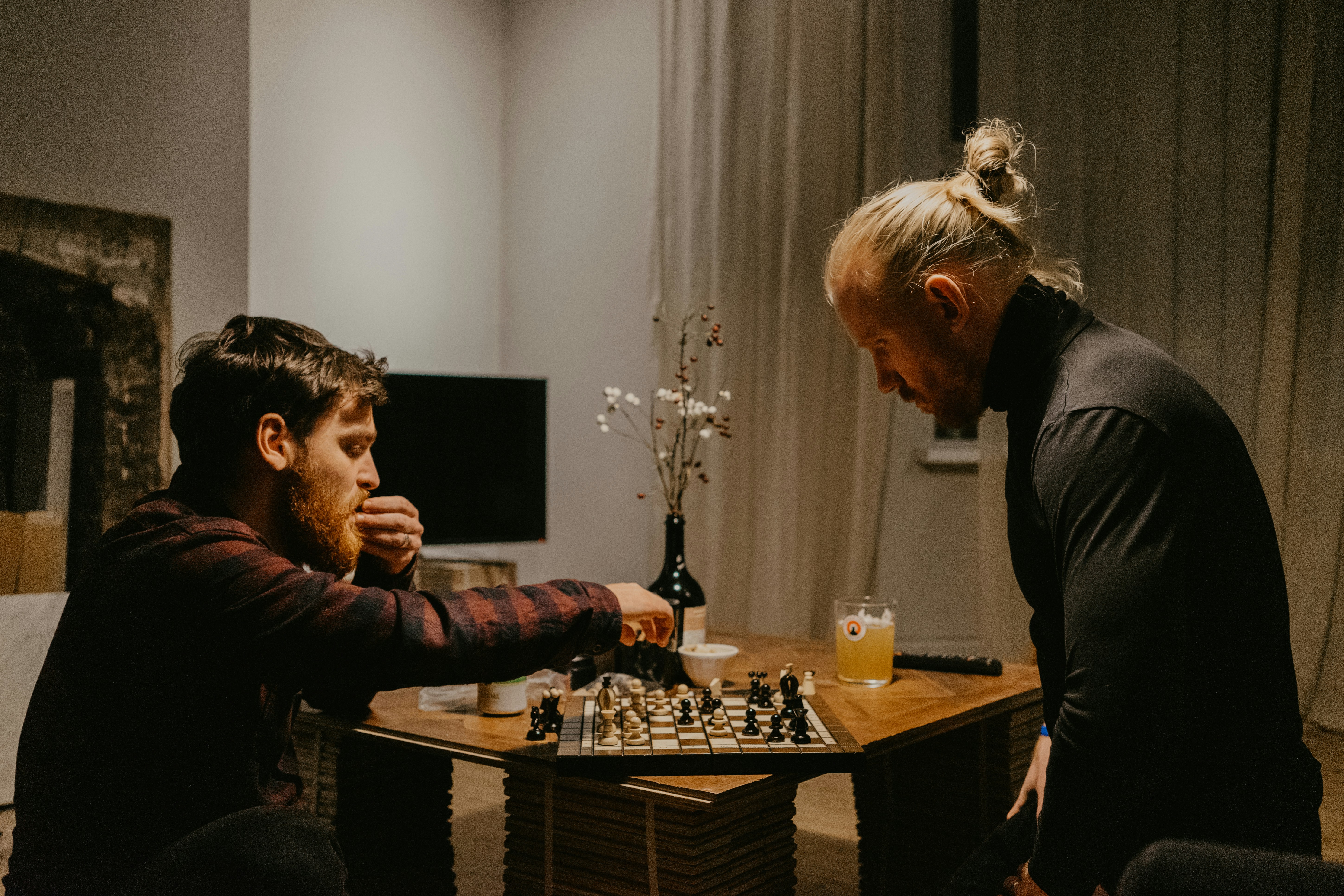 Coach and student playing chess