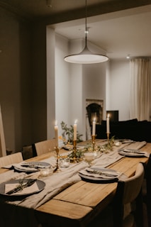 dining table with plates and drinking glasses