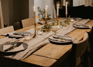 dining table with plates and drinking glasses