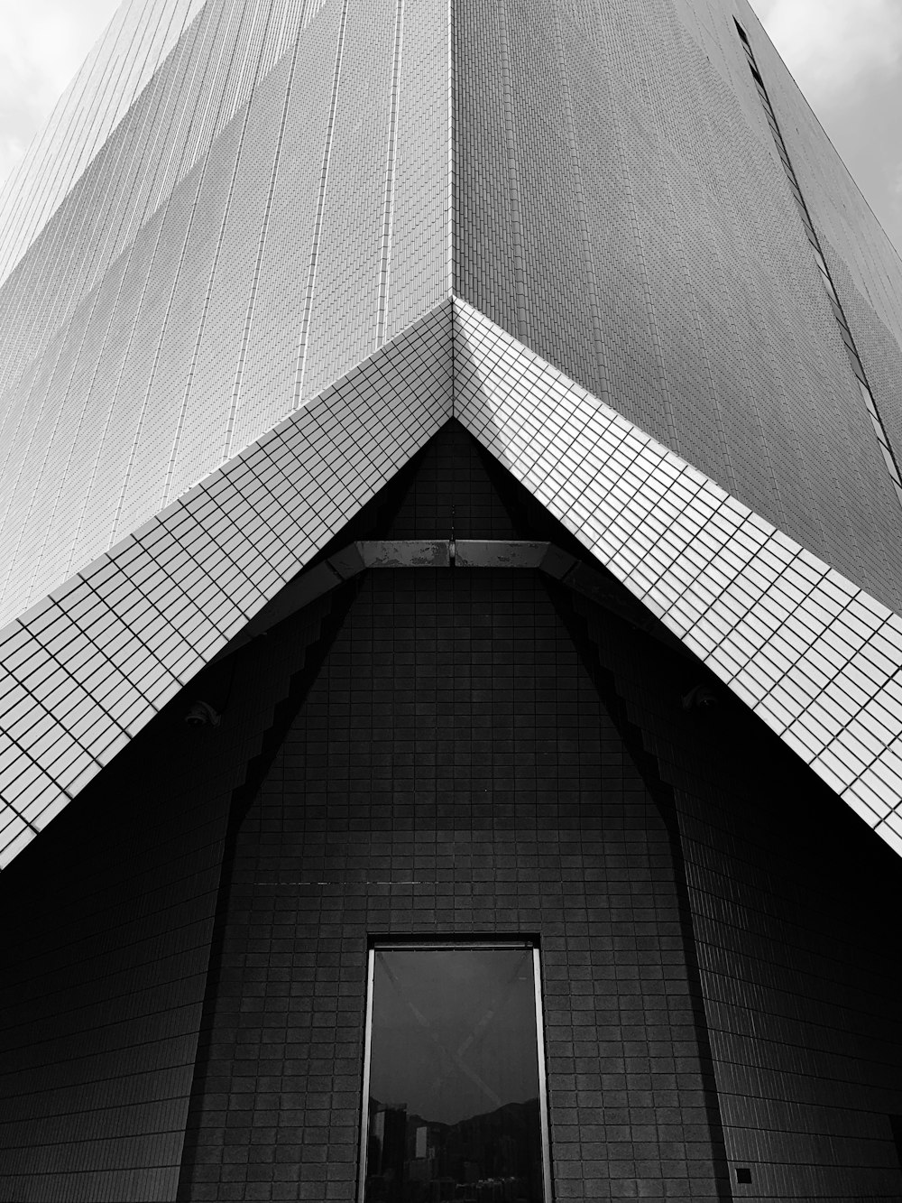 grayscale photo of concrete building