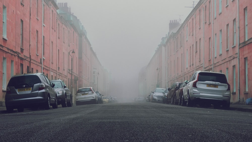 cars parked on side of the road during daytime