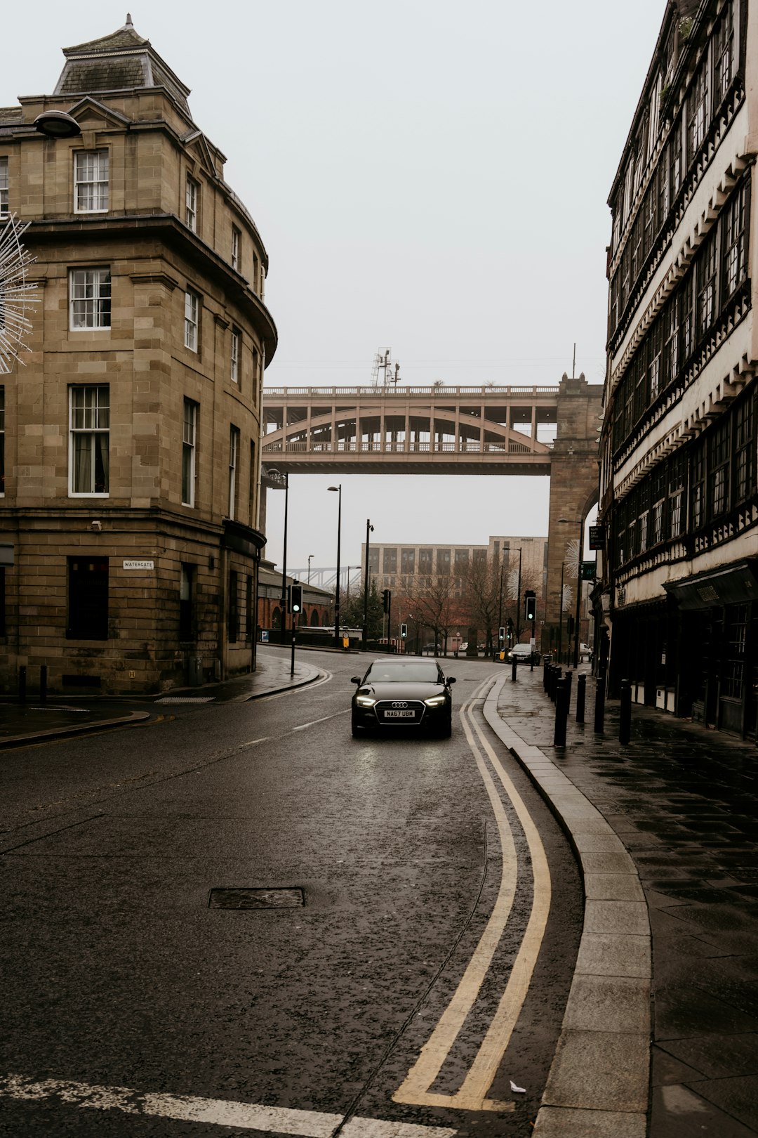 cars on road near building during daytime