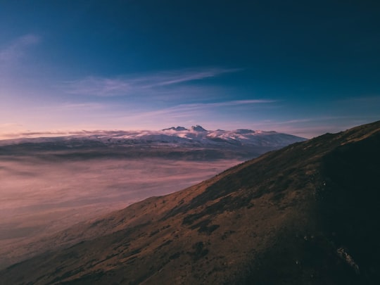 brown and green mountains under blue sky during daytime in Mount Aragats Armenia