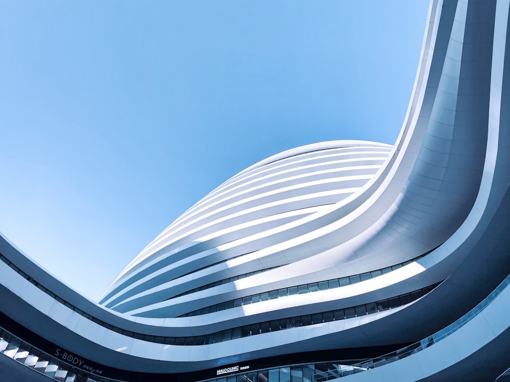 white concrete building under blue sky during daytime