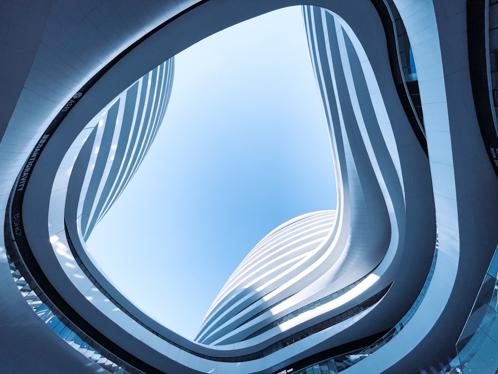 white and blue spiral stairs