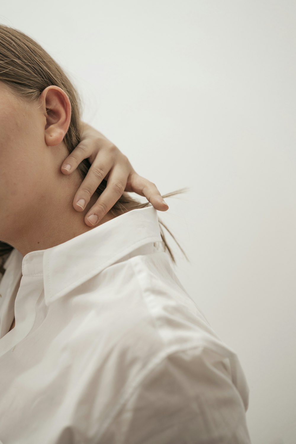 woman in white dress shirt