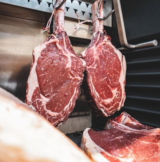 raw meat on stainless steel tray