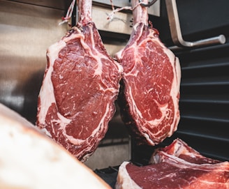 raw meat on stainless steel tray