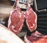 raw meat on stainless steel tray