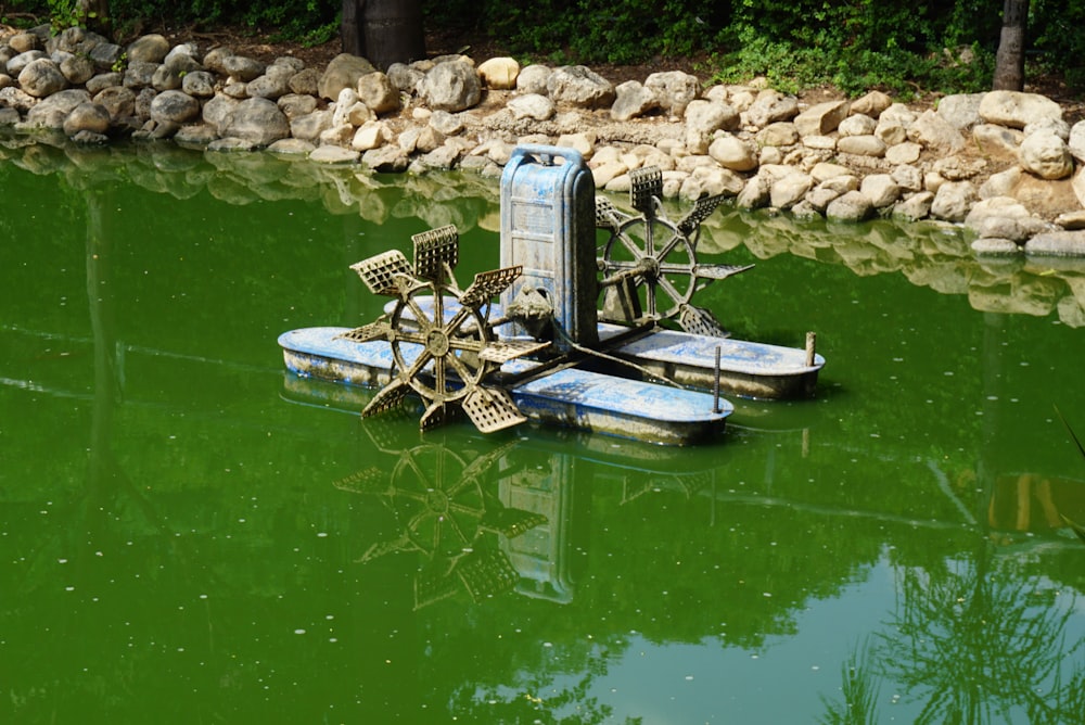 white and black boat on water