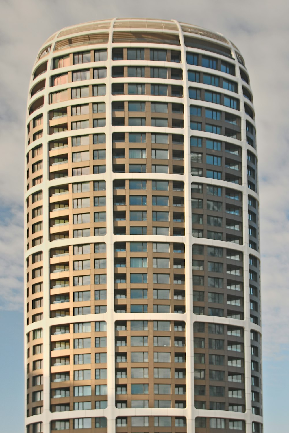 white and black concrete building under blue sky during daytime