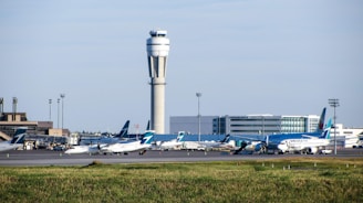 white passenger plane on airport during daytime