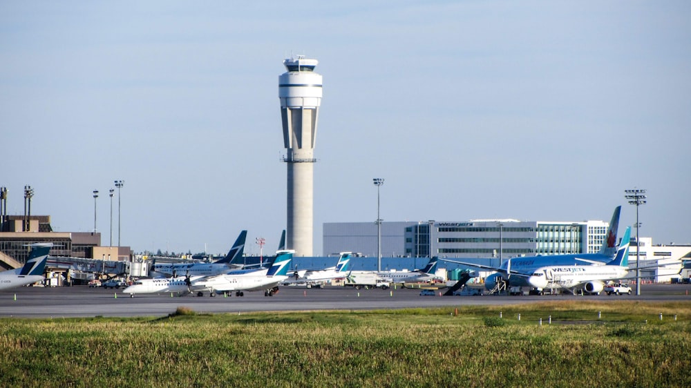 white passenger plane on airport during daytime