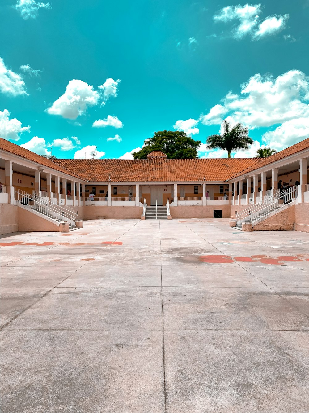 brown concrete building under blue sky during daytime