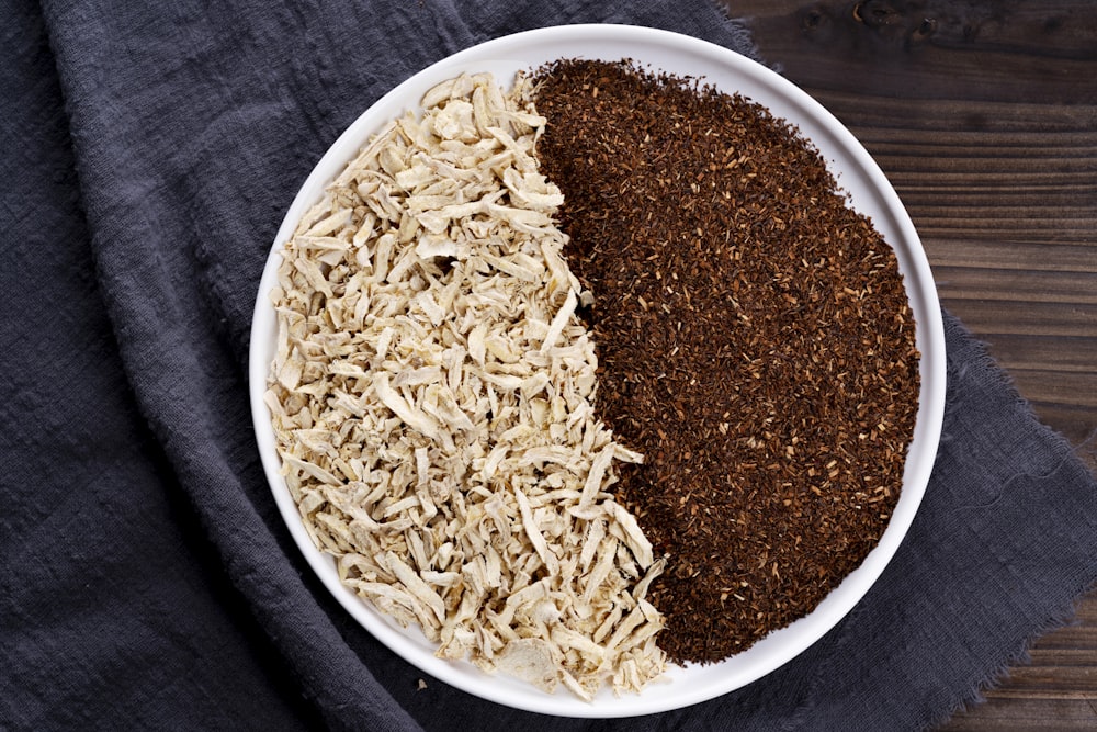 brown rice on white ceramic bowl