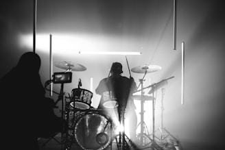 man playing drum on stage