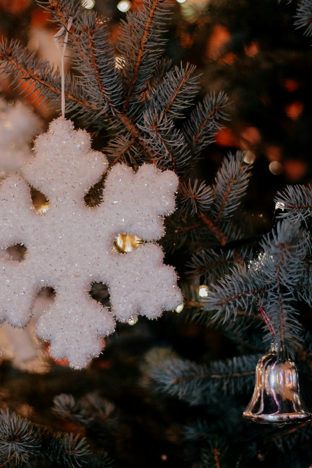 white snow on green pine tree