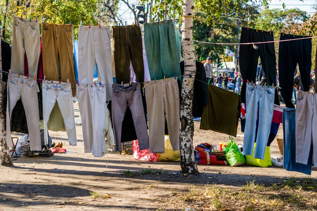 clothes hanged on clothes line during daytime