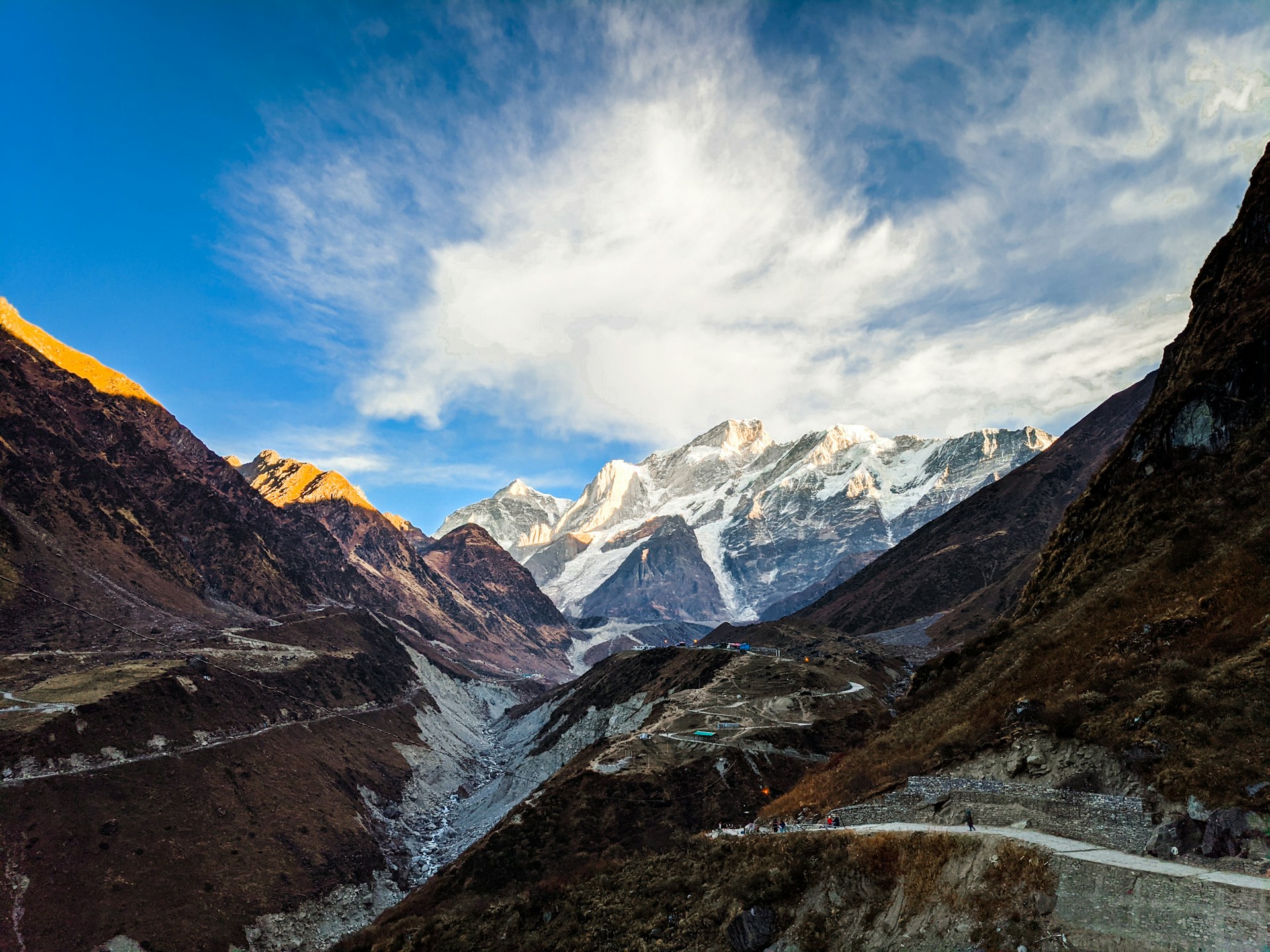 snow covered mountains under blue sky during daytime