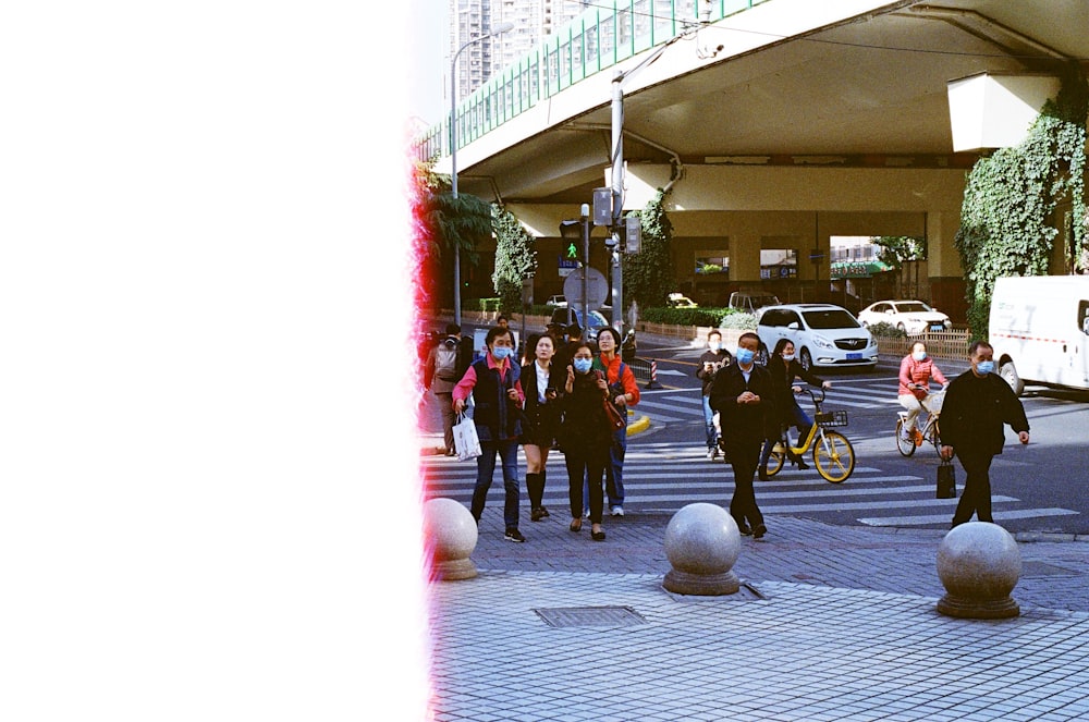 people walking on pedestrian lane during daytime