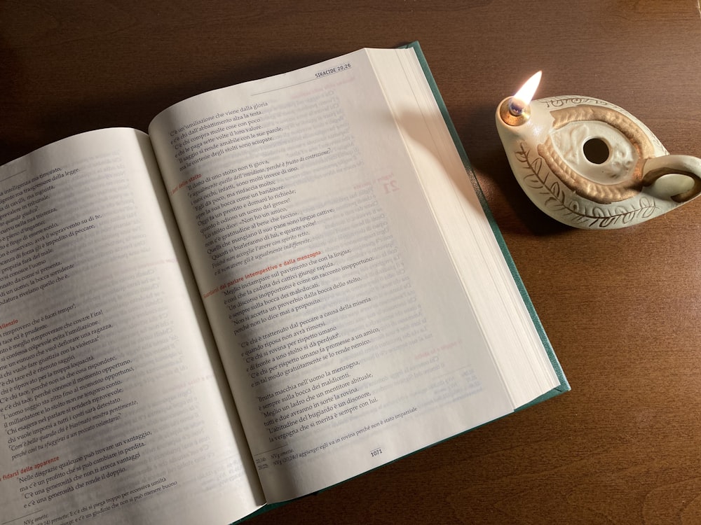 white book page on brown wooden table