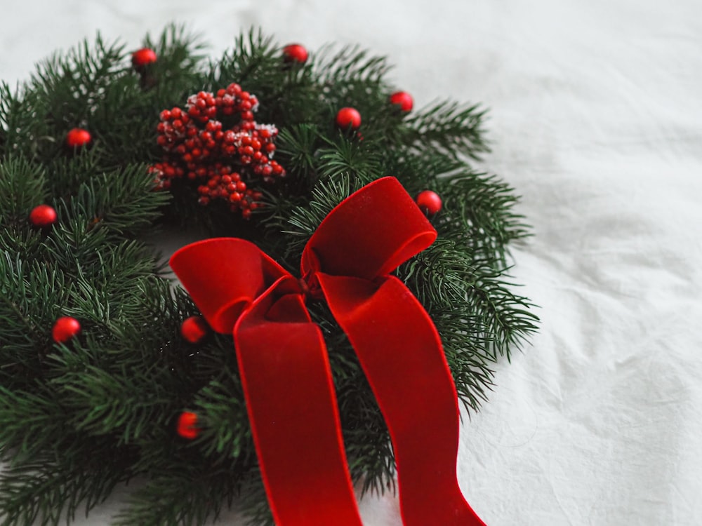 red ribbon on green christmas tree