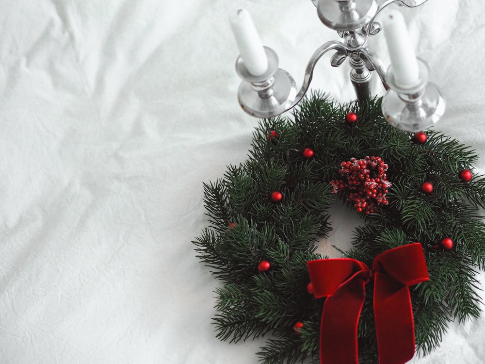 red and silver baubles on white textile