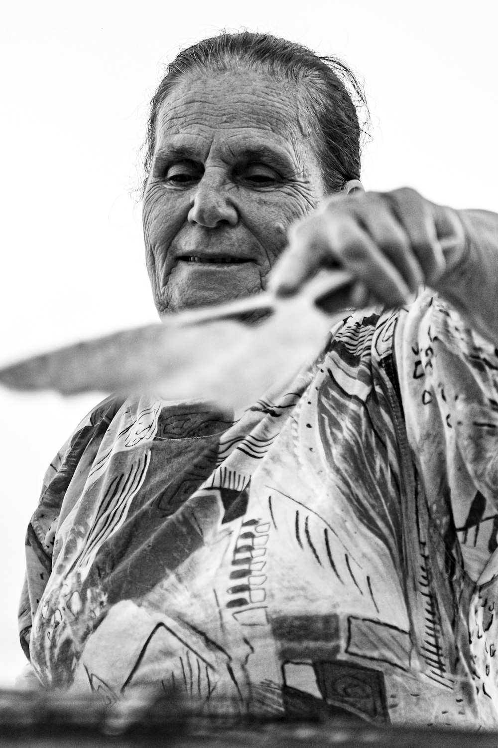 grayscale photo of man in button up shirt