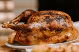 roasted chicken on white ceramic plate