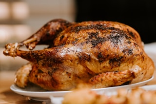 roasted chicken on white ceramic plate