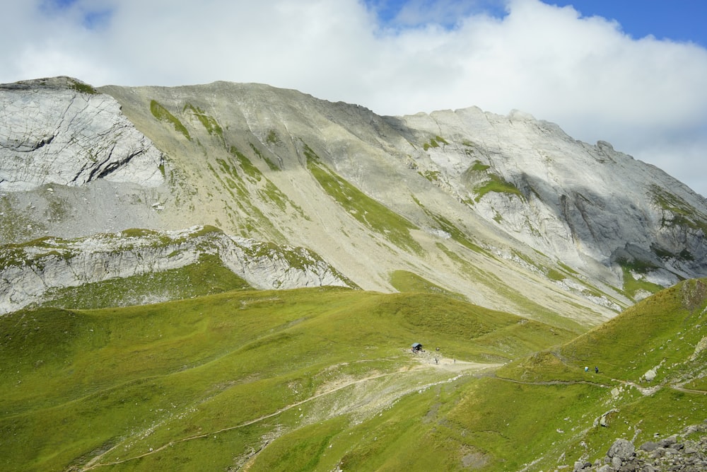 green and white mountain under blue sky during daytime