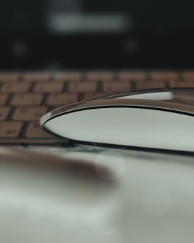 Close-up image of high-quality refurbished tech accessories like keyboards and mice with a modern design.