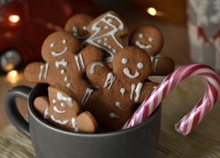 brown cookies in white ceramic mug