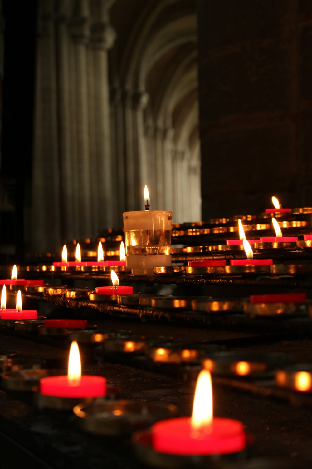 lighted candles on black table