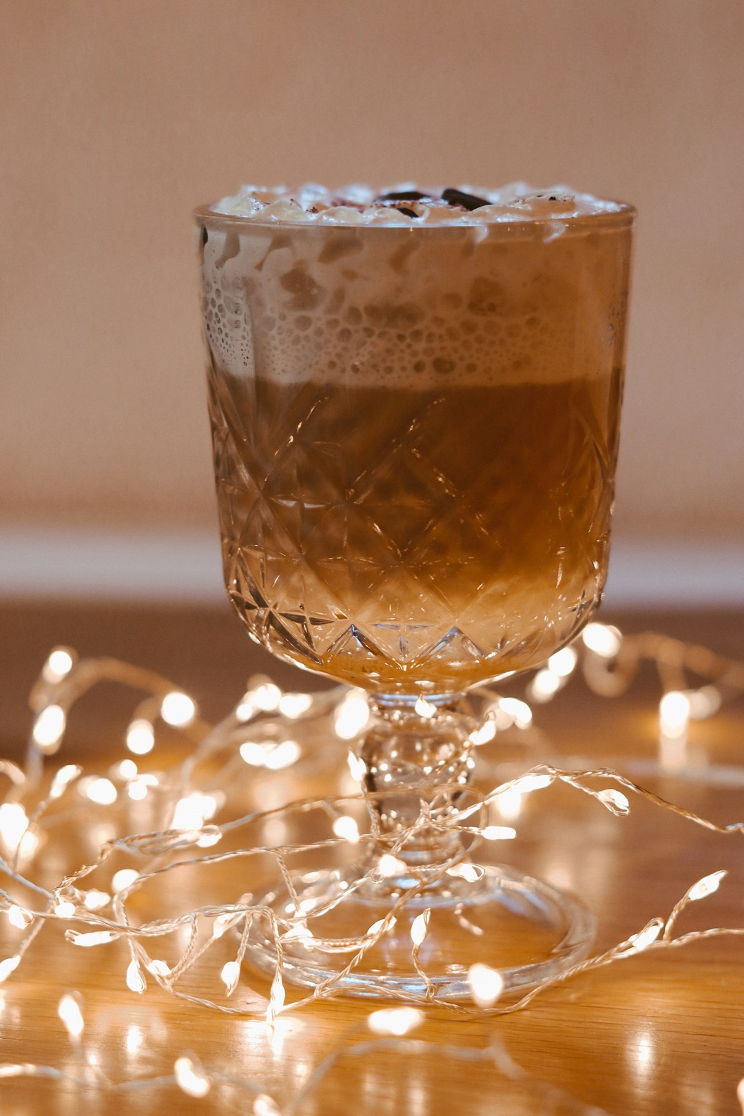 clear glass cup with brown liquid