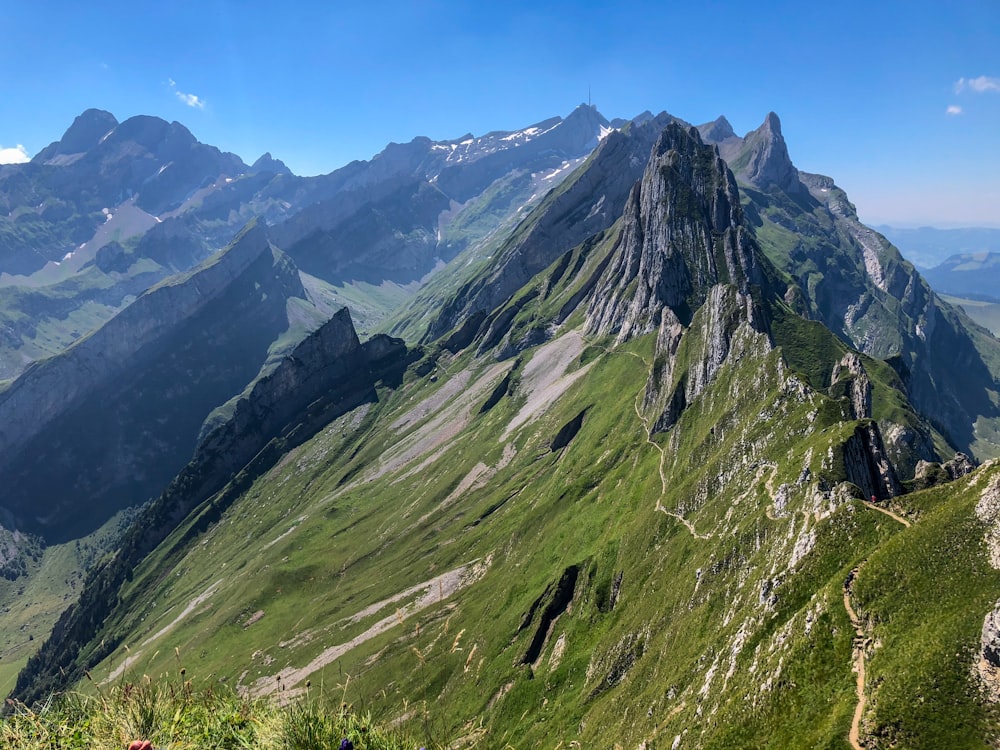 green and gray mountain under blue sky during daytime