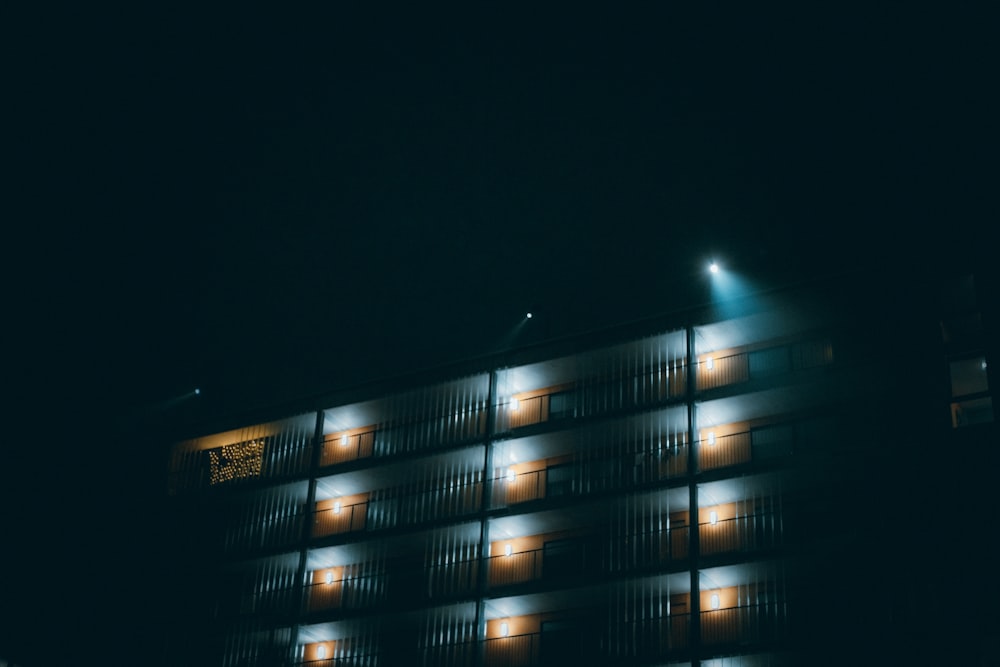 lighted high rise building during night time