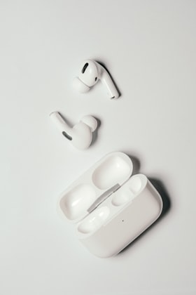 Wireless earbuds resting in an open charging case — insung yoon on Unsplash