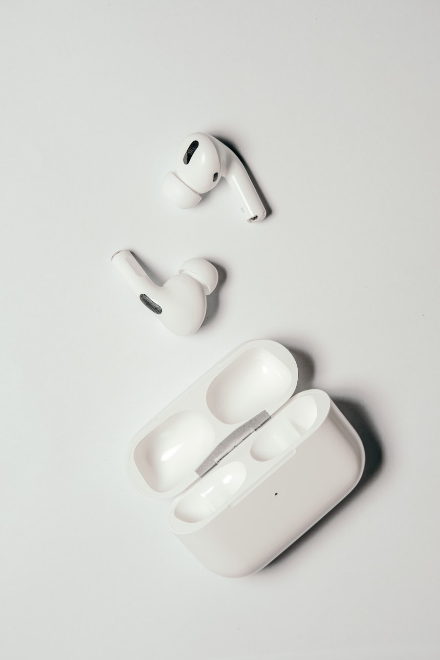 AirPods 4 with charging case featuring the new smaller design and H2 chip