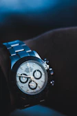 Elegant Tissot wristwatch featuring a polished stainless steel case and classic design.