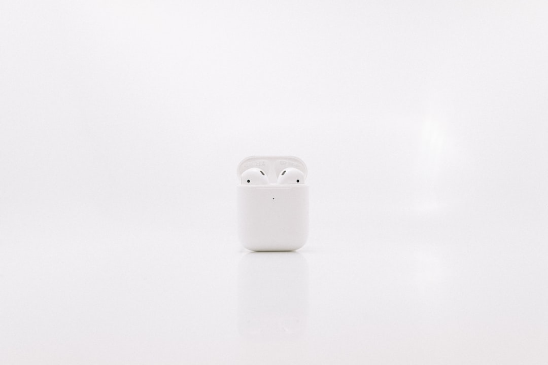 white apple airpods charging case