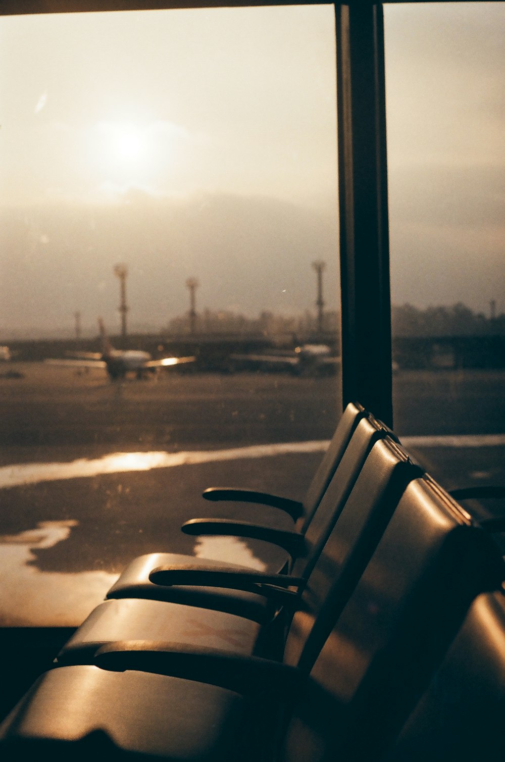 black and white chair near window